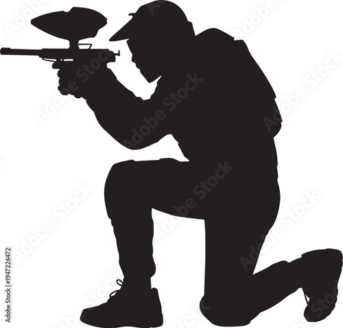 Silhouette of paintball player kneeling with marker gun aiming focused on target isolated on transparent background