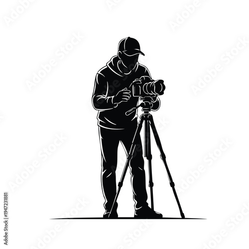 Photographer silhouette with professional camera on tripod