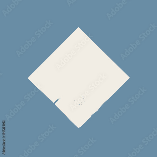 Elegant Ivory Paper Napkin on Minimalistic Blue Background Highlighting Texture and Embossed Design in Soft Natural Light