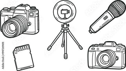 Collection of creative media equipment for content creation, including cameras and microphone