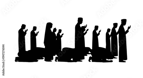 Silhouette of people performing prayer in a unified stance together