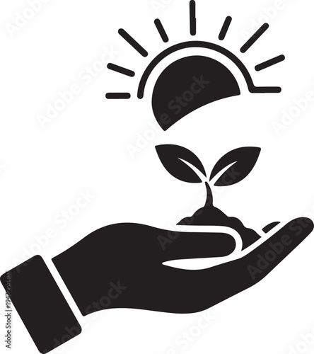 Hand holding a small green plant.