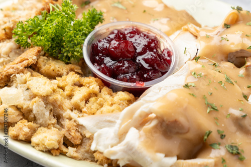 Traditional turkey dinner with gravy stuffing and cranberry sauce