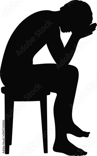 Black silhouette of a depressed person sitting on a stool with head in hands, representing grief, stress, and mental health
