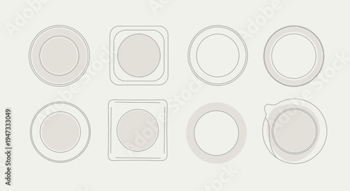 Set of empty white ceramic plates with various shapes and sizes arranged on a white background.