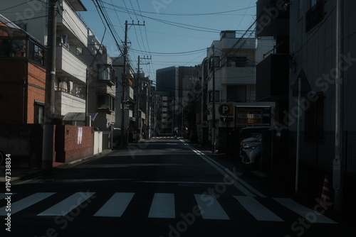 Wallpaper Mural Quiet residential street with crosswalk and overhead power lines in urban Japan Torontodigital.ca
