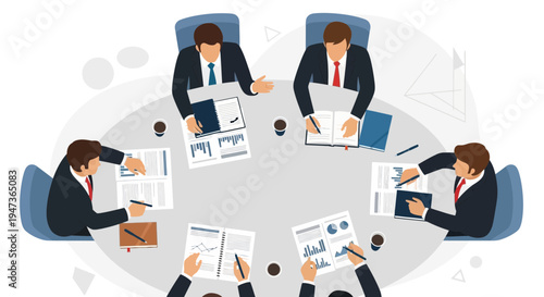 Business Meeting Around A Round Table With Documents and Charts