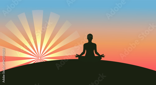 Silhouette of person meditating on a hill at sunrise with sunburst effect