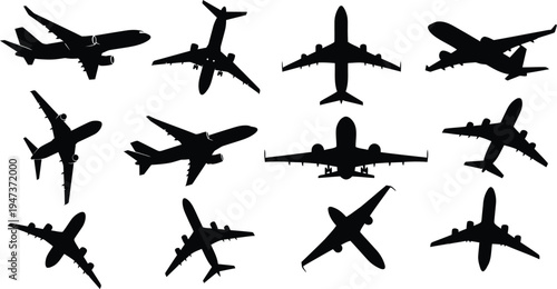 Collection of airplane silhouettes in various flight positions