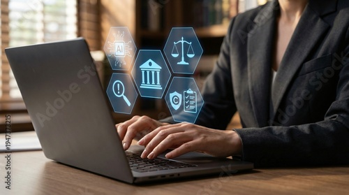 AI in Legal & Compliance: Business Professional Working on Laptop with Futuristic Holographic Icons for Justice, Regulation, Audit, and Governance