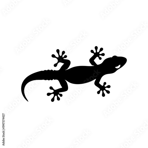 A sleek black silhouette of a lizard with distinctive body markings and tail