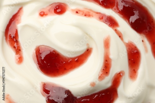 Delicious yogurt with strawberry jam as background, top view