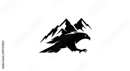 Eagle soaring above mountain peaks