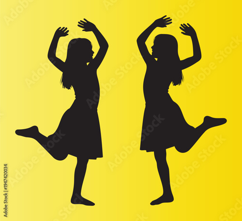 Silhouettes of two dancing children in playful poses