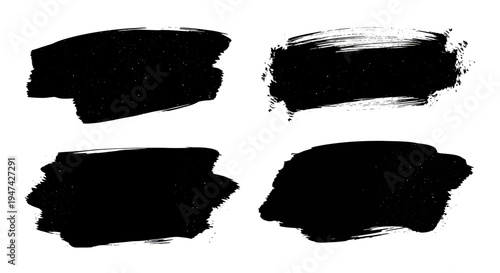 Four Black Ink Brush Strokes on White Background.