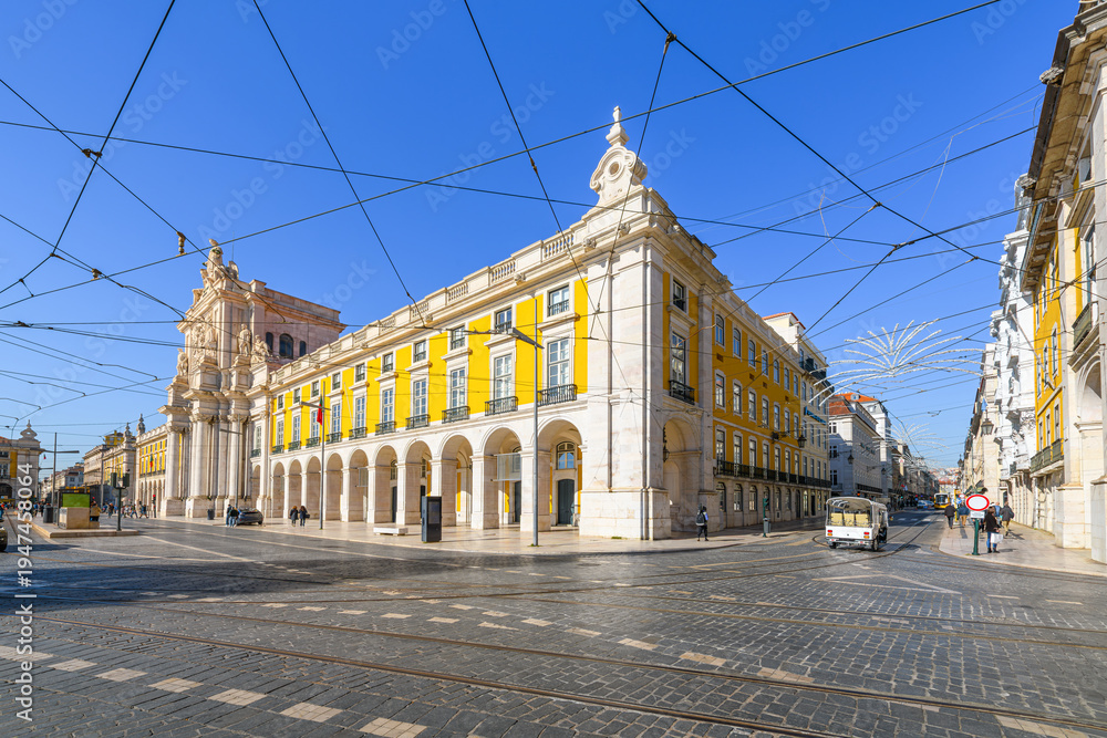 Fototapeta premium The facade and entrance of the Arco do Comércio Rua Augusta Arch at Praça do Comércio Commerce Square along the waterfront in the Baixa District of Lisbon Portugal.