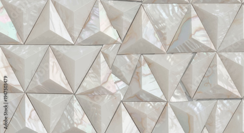 Mother of pearl triangular mosaic pattern white background shiny surface decorative design element