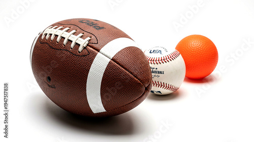 A collection of sports balls including an american football, a baseball, and an orange rubber ball
