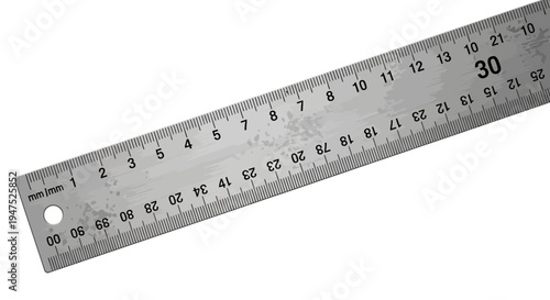 Close-up of a metal ruler with clear markings on a white background