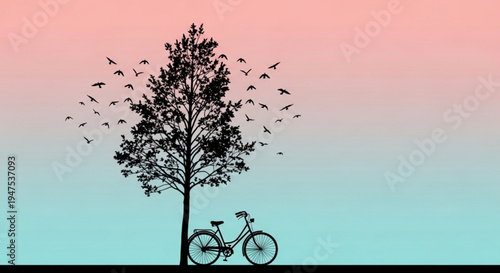 Silhouette of bicycle under tree with birds flying away at sunset or sunrise with pink and blue gradient sky
