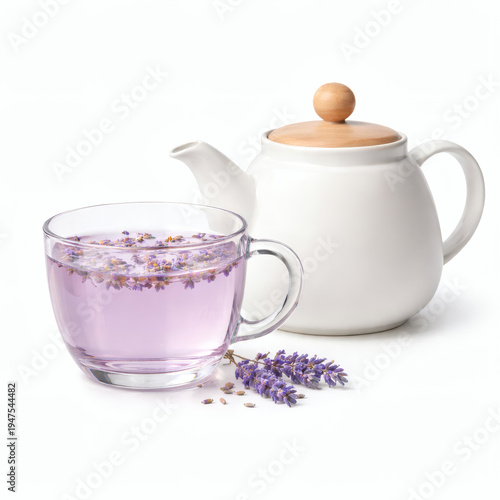Lavender herbal tea in glass cup with teapot isolated on white background for relaxing drink concept