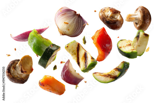 Flying grilled vegetable pieces with zucchini onion mushroom and bell pepper isolated on transparent background