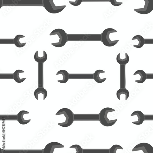Repeating pattern of dark gray wrenches against a white background