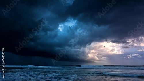 Dramatic storm clouds over turbulent ocean waves