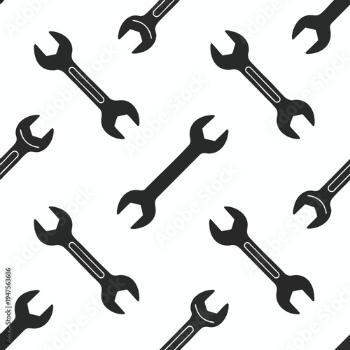 Seamless pattern of black spanners on a white background