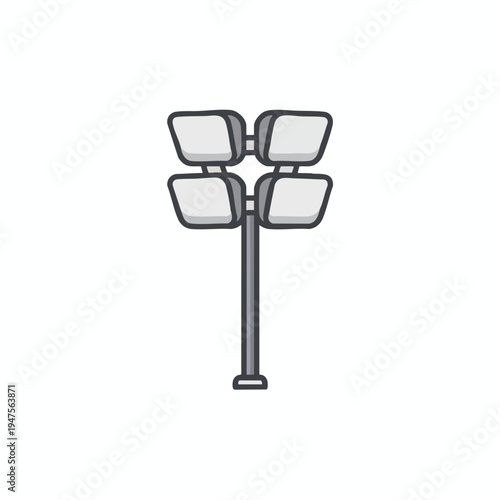 Four-headed floodlight pole, illuminated at night