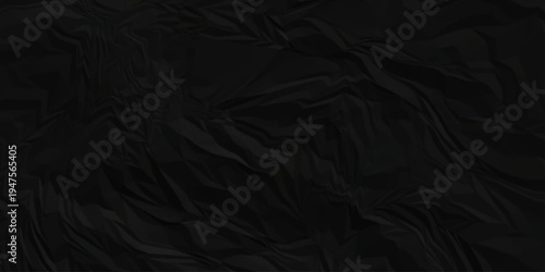 Dark black crumpled paper texture background. black crumpled and top view textures can be used for background of text or any contents.