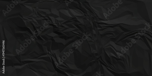 Dark black crumpled paper texture background. black crumpled and top view textures can be used for background of text or any contents.