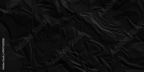 Dark black crumpled paper texture background. black crumpled and top view textures can be used for background of text or any contents.