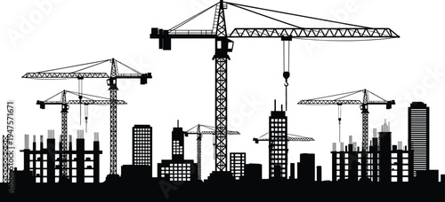 Construction site silhouette with cranes and unfinished buildings Keywords: construction, site, silhouette, cranes, tower cranes
