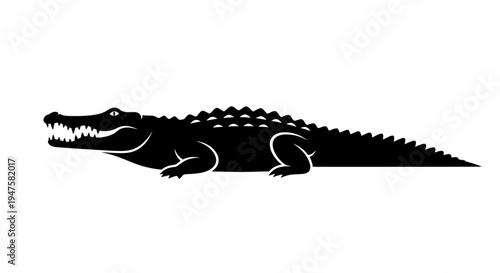Black silhouette of a crocodile animal.
