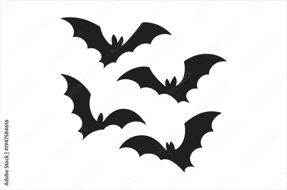 Fototapeta premium Four black silhouettes of bats in flight against a plain white background