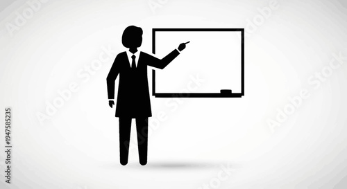 Businessman pointing at whiteboard in suit.