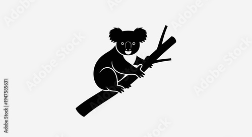 Koala sitting on a tree branch.