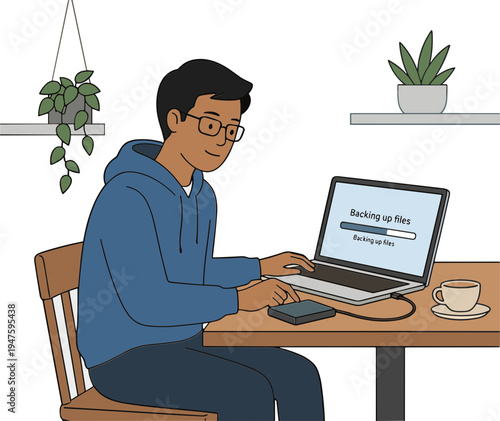 Man sitting at table working on laptop with cup and plants nearby indoors