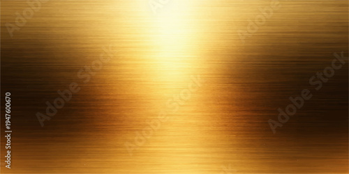Shiny gold and silver metallic surface featuring a brushed texture pattern on a polished stainless steel plate backdrop