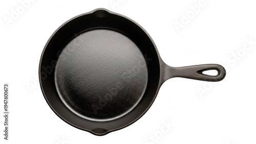 A cast iron skillet with a glossy, seasoned interior, viewed from above at a slight angle.