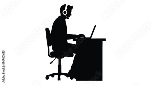 A person wearing a headset sits at a desk with a laptop