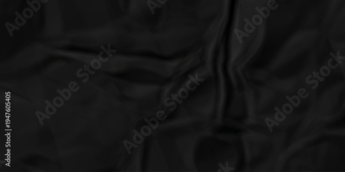 Crumple crushed black paper obsolete rumple craft design. wrinkle ripped creased crumple aged closeup recycled document grunge paper background.