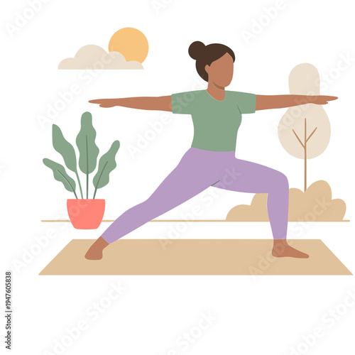 A woman practices yoga outdoors on a mat with a plant and tree