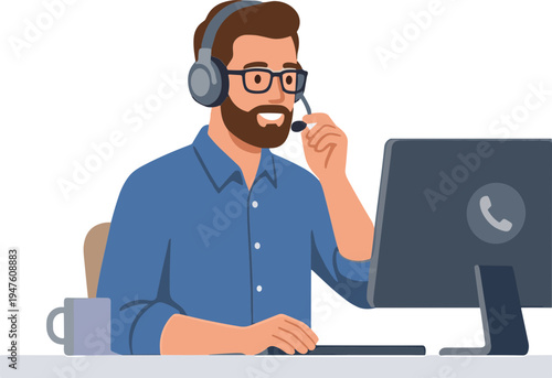 Man wearing headset talks on phone at desk with computer