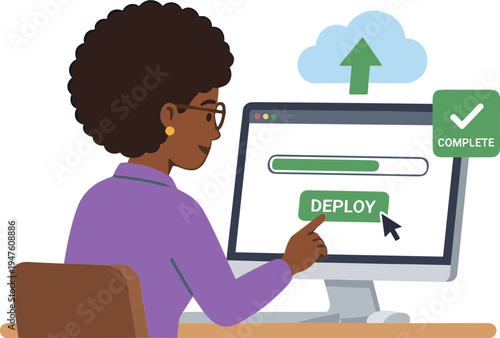 Woman sits at desk deploying application on computer screen in office