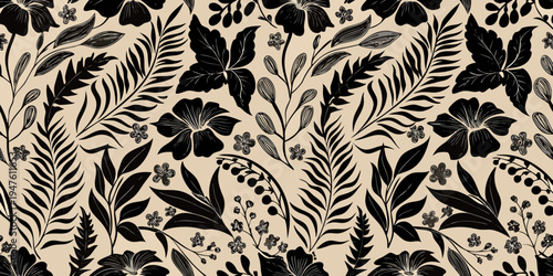Elegant black tropical leaves and flowers on a beige background