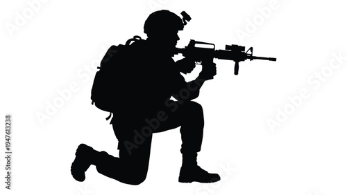 A soldier in a kneeling position aiming a rifle