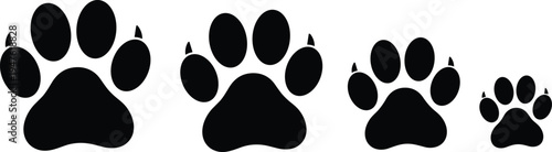 Black animal paw prints in different sizes on white background