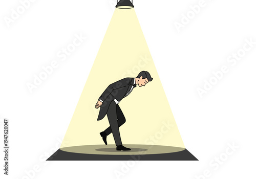 Man in Tuxedo Bowing Under Spotlight on Stage.